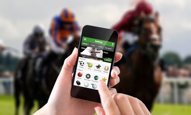 Horses running with the Betway betting app overlayed
