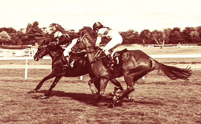 An Epsom Derby vintage race with a close up of two horses