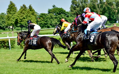 Lyon all-weather historic racecourse, with horses running