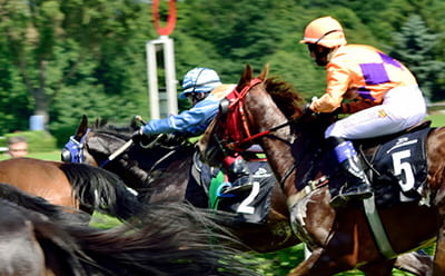 A modern Newmarket race with a close up of the riders