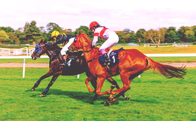 Sandown Park vintage racecourse, with an old race taking place