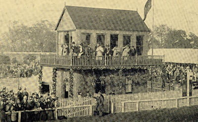 A vinatge look at the Thirsk grandstand, with a huge crowd and in black and white