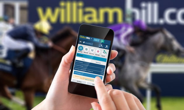 Horses running at a William Hill sponsored race